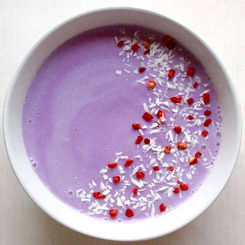 Purple sweet potato smoothie bowl — anthocyanin-rich superfood goodness.