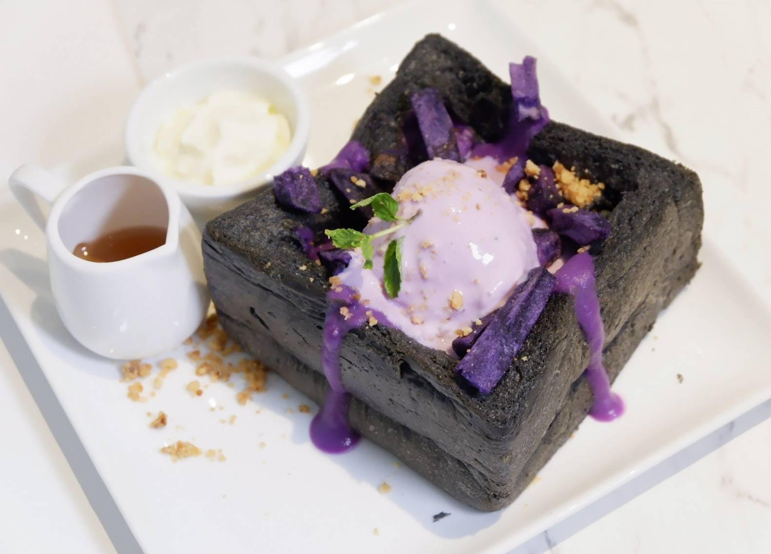 Charcoal toast topped with purple sweet potato ice cream — a premium clean-label dessert.